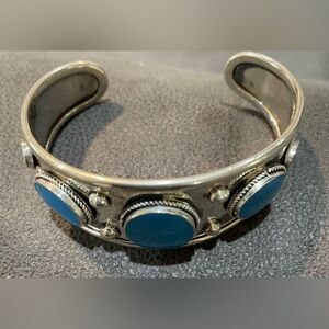Sterling cuff with turquoise blue stones beautiful